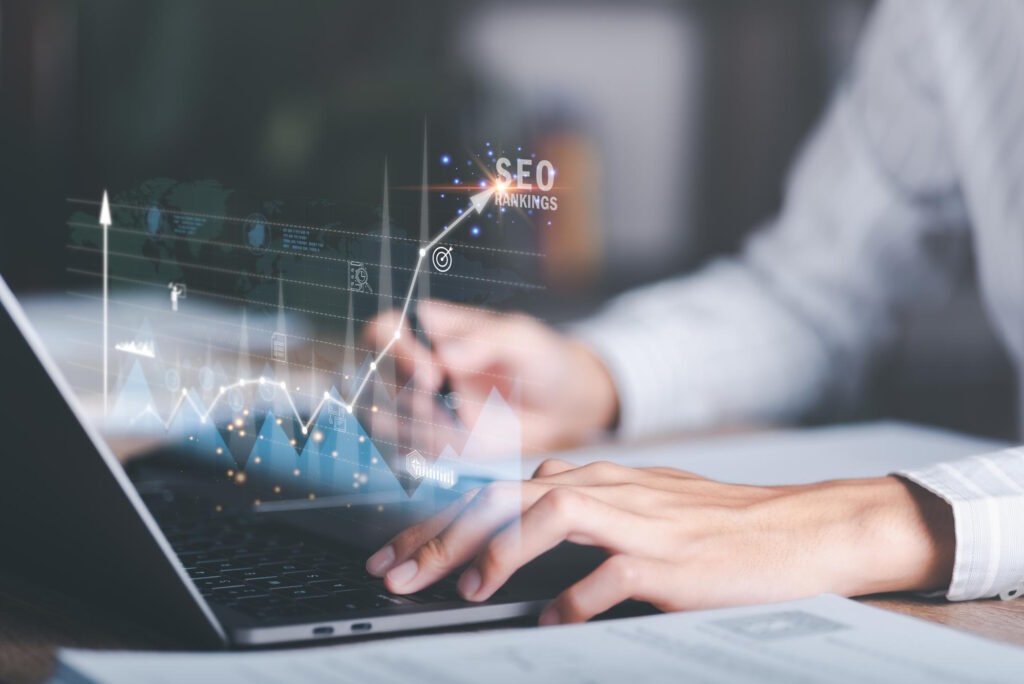Professional using laptop with holographic SEO rankings analytics and growth charts displaying semantic search optimization results