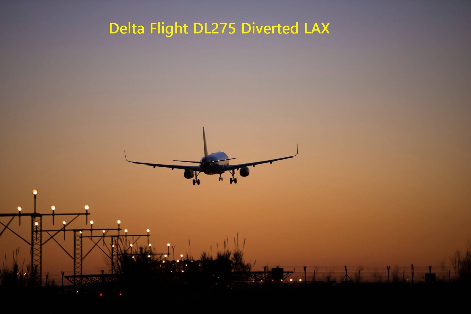 Delta Air Lines aircraft approaching LAX airport during sunset with runway lights visible after emergency diversion from Tokyo route