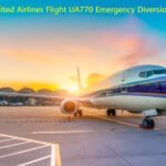 United Airlines Boeing 787 Dreamliner aircraft parked on airport tarmac at sunset with terminal buildings in background, representing Flight UA770 emergency diversion